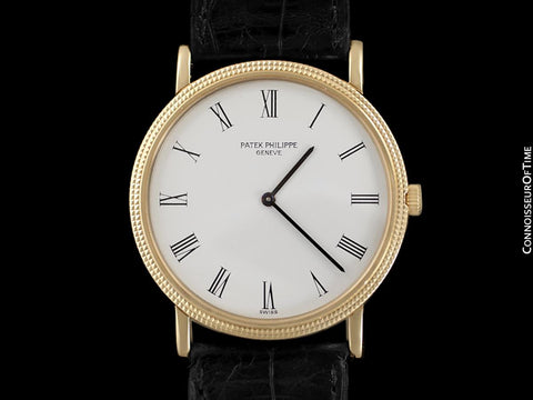 Patek Philippe Calatrava Mens Handwound Ultra Thin Watch, Ref. 3520 - 18K Gold with Hobnail Bezel