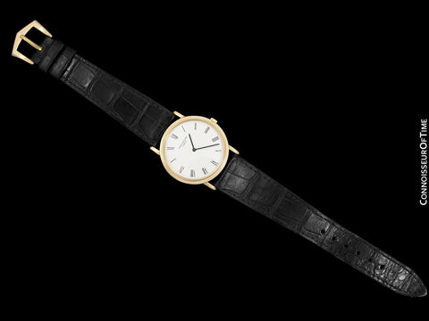 Patek Philippe Calatrava Mens Handwound Ultra Thin Watch, Ref. 3520 - 18K Gold with Hobnail Bezel