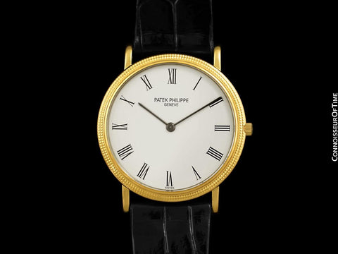 Patek Philippe Calatrava Mens Ultra Thin Watch, Ref. 3744 - 18K Gold with Hobnail Bezel
